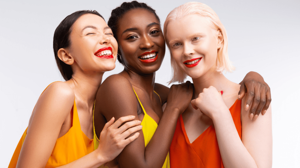 Three beautiful women with different nationalities - all warm skin tones