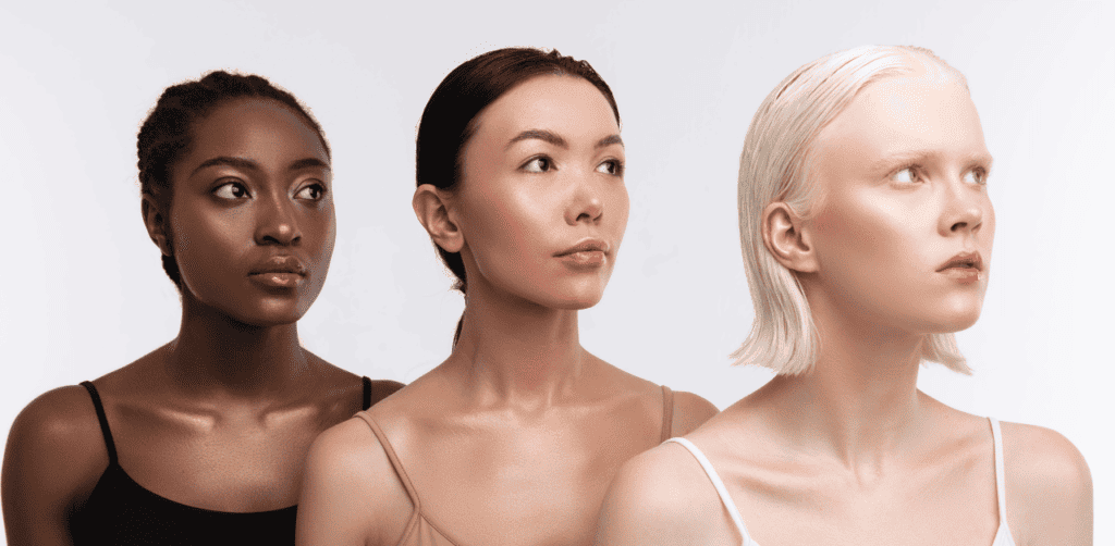 Three women models on how to determine skin undertone