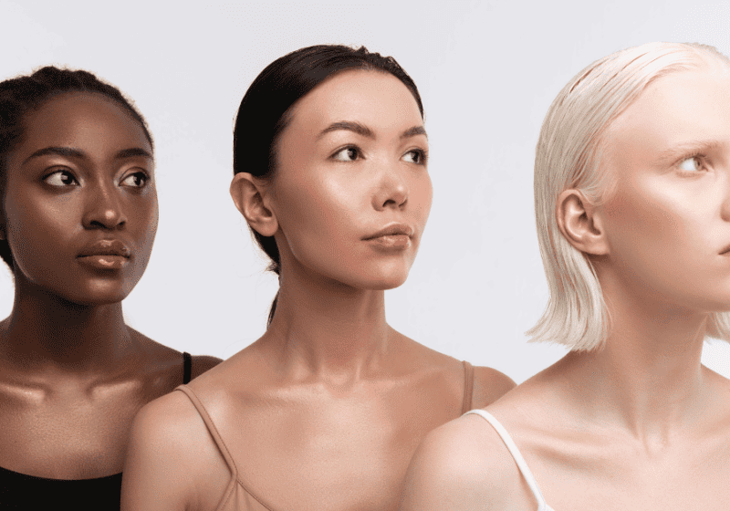 Three women models on how to determine skin undertone