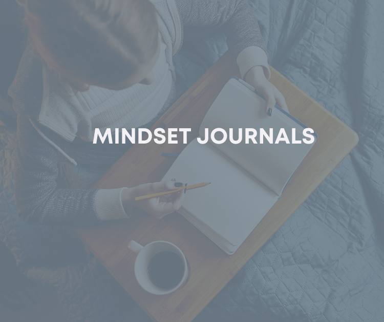 Woman Writing in a Mindset Journal