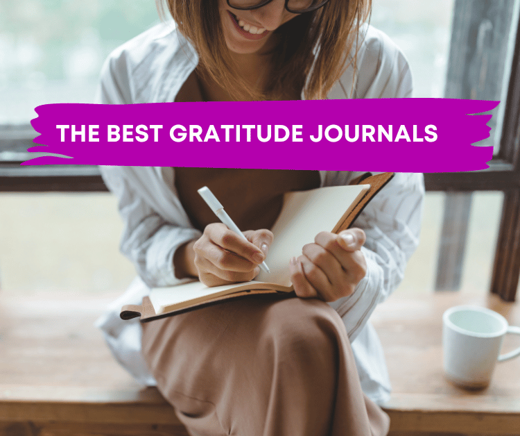 Woman writing in a a best gratitude journal