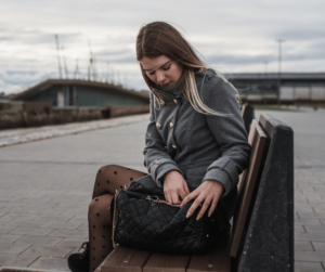 Reaching into purse for items to calm down