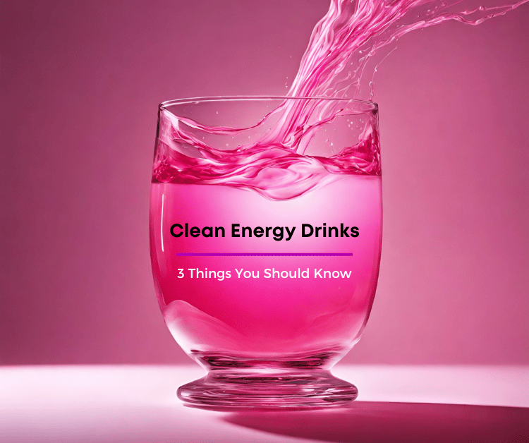A glass of pink liquid clean energy drink