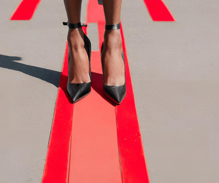 woman in stilettos standing on a line not crossing personal boundaries